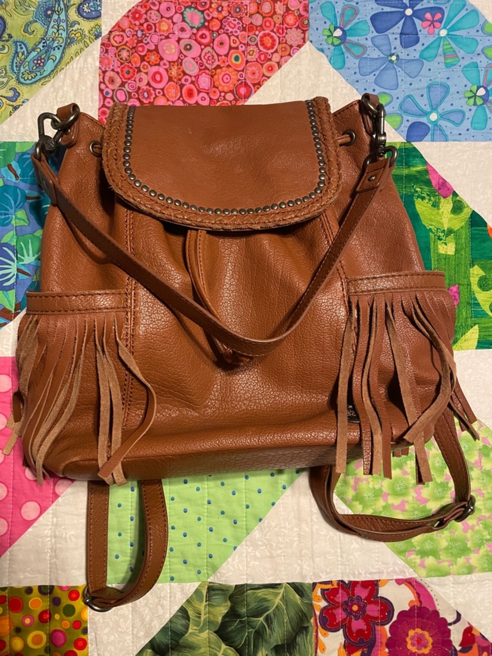 The Sak Leather Fringe Backpack in Cognac Brown